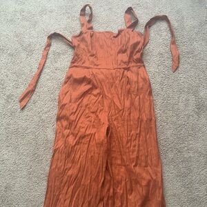 Women's burnt orange/rust cropped jumpsuit with tie back and wide straps
